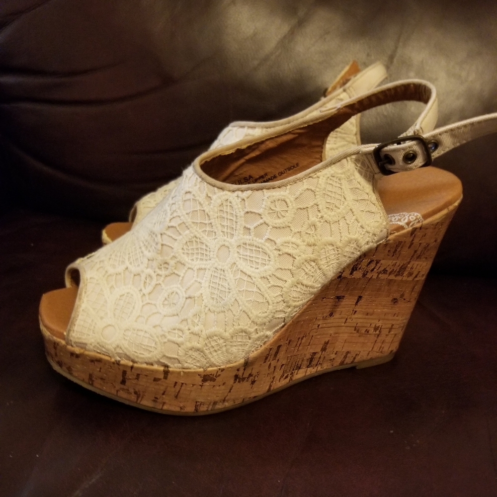 Tan wedges with white lacing size 7